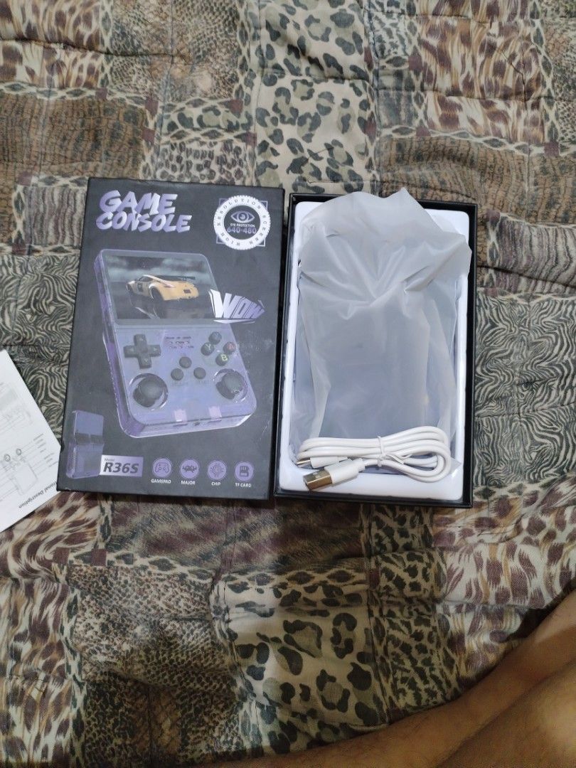 R36S Retro Handheld Game Console Purple (Category: Others) located in Manila. Submitted by marky.flip (Listing ID 1441137280, Image 3). Description: Original HandHeld Console Model: -R36S HANDHELD CONSOLE Details: -Over 22,022 Games and you can add more -128 sd card -Ready to play Battery: 3500mAh Color: -TRANSPARENT PURPLE PRICE: ₱2,350 Pwede Testing Bago kunin Shipping: • Lalamove (Metro Manila – COD) • J&T Express, LBC (Provincial ship) •Open 