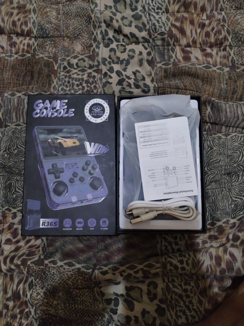 R36S Retro Handheld Game Console Purple (Category: Others) located in Manila. Submitted by marky.flip (Listing ID 1441137280, Image 2). Description: Original HandHeld Console Model: -R36S HANDHELD CONSOLE Details: -Over 22,022 Games and you can add more -128 sd card -Ready to play Battery: 3500mAh Color: -TRANSPARENT PURPLE PRICE: ₱2,350 Pwede Testing Bago kunin Shipping: • Lalamove (Metro Manila – COD) • J&T Express, LBC (Provincial ship) •Open 