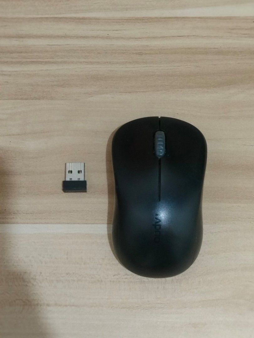 RAPOO Black Wireless Optical Mouse with USB Dongle (Category: Mouse & Mousepads) located in Manila. Submitted by declutter.rizz (Listing ID 1440981925, Image 1). Description: - Black wireless mouse - Includes USB receiver -Battery Operated - Works well for everyday computer use - Easy plug-and-play connection.
