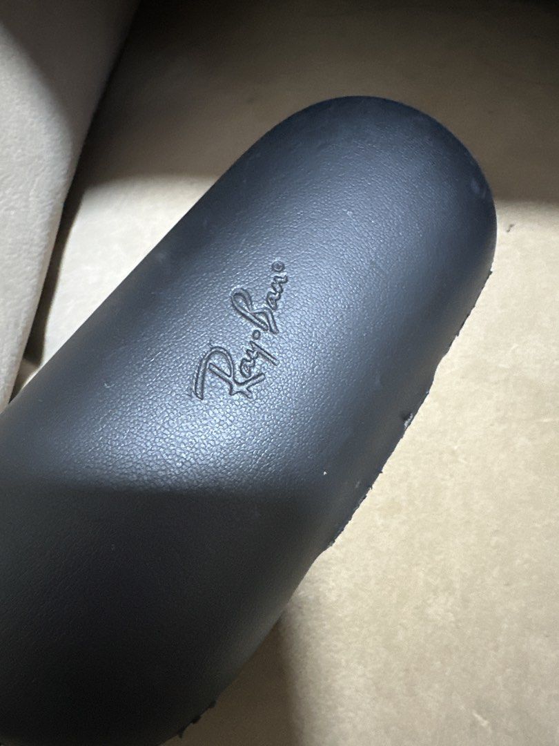 Raybans (Category: Sunglasses & Eyewear) located in Singapore. Submitted by fundingforelectricforest (Listing ID 1441043839, Image 3). Description: Not sure if still charging as one side fell off ( no wire ) Overall still good can wear as normal glasses Polarized .