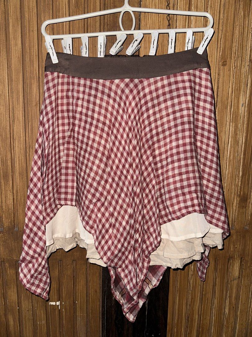 Red and White Gingham Asymmetrical Layered Skirt (Category: Skirts) located in Taguig. Submitted by lovedbym.sell (Listing ID 1440961539, Image 1). Description: Waist: 30 in Length: 17 in (shortest); 25 in (longest) RFS: declutterinh.