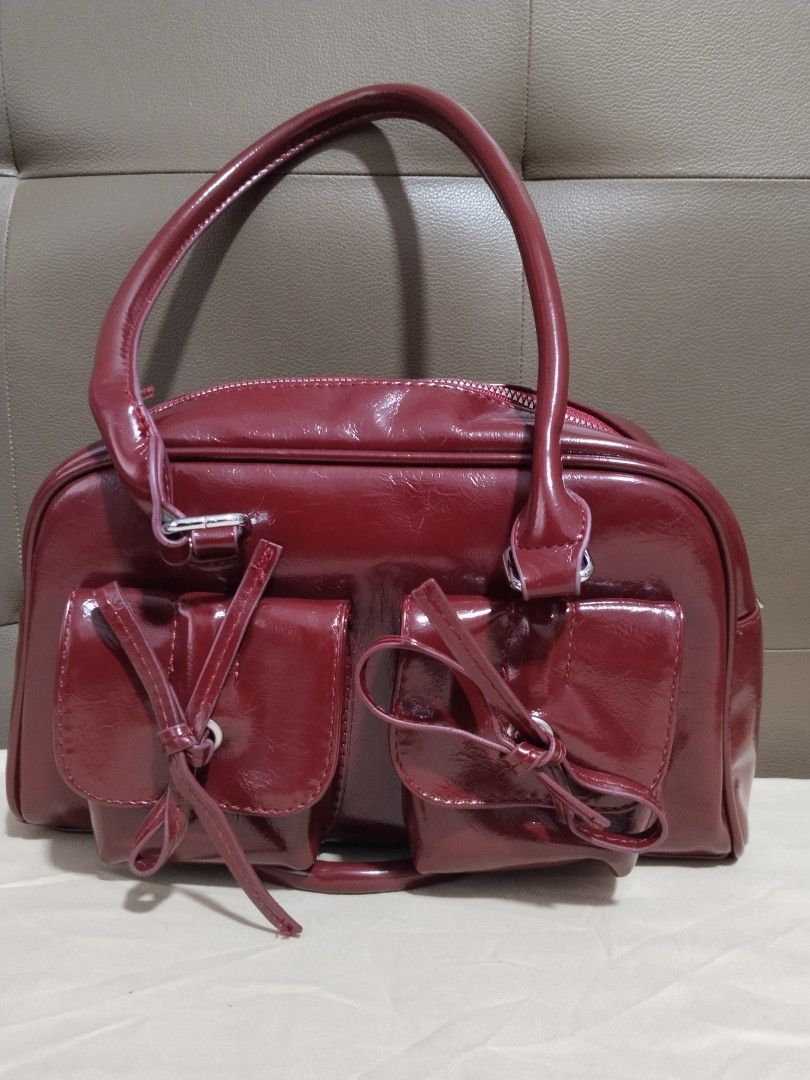 Red Patent Leather Handbag with Front Pockets (Category: Luxury Bags & Wallets) located in Manila. Submitted by janelletadeja (Listing ID 1441014243, Image 1). Description: MOD -jnt - lalamove MOP - gcash - bank transfer.