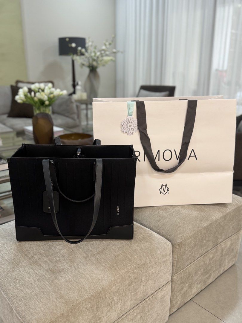 Rimowa never still tote bag (Category: Tote Bags) located in Makati City. Submitted by kirstenmuriel (Listing ID 1441016565, Image 1). Description: Gift of my husband Christmas Used twice only Selling because not using Pick up makati .