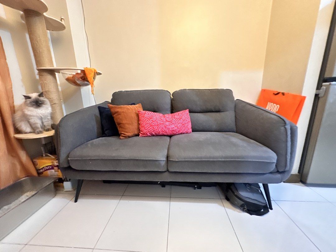 ROBIN Sofa (Mandaue Foam) (Category: Sofas) located in Quezon City. Submitted by tin.008 (Listing ID 1441101667, Image 3). Description: - ROBIN 2-Seater Sofa - Brand: Mandaue Foam - Material: Fabric - Color: Dark Gray - Style: Modern, sleek design with tapered legs - bought last January - never been wet - Dimensions: 179.1cm (L) x 88.9cm (W) x 86.3cm (H) - Perfect for apartments, condos, or small living spaces - bought at 28,000 - fits 3 people -