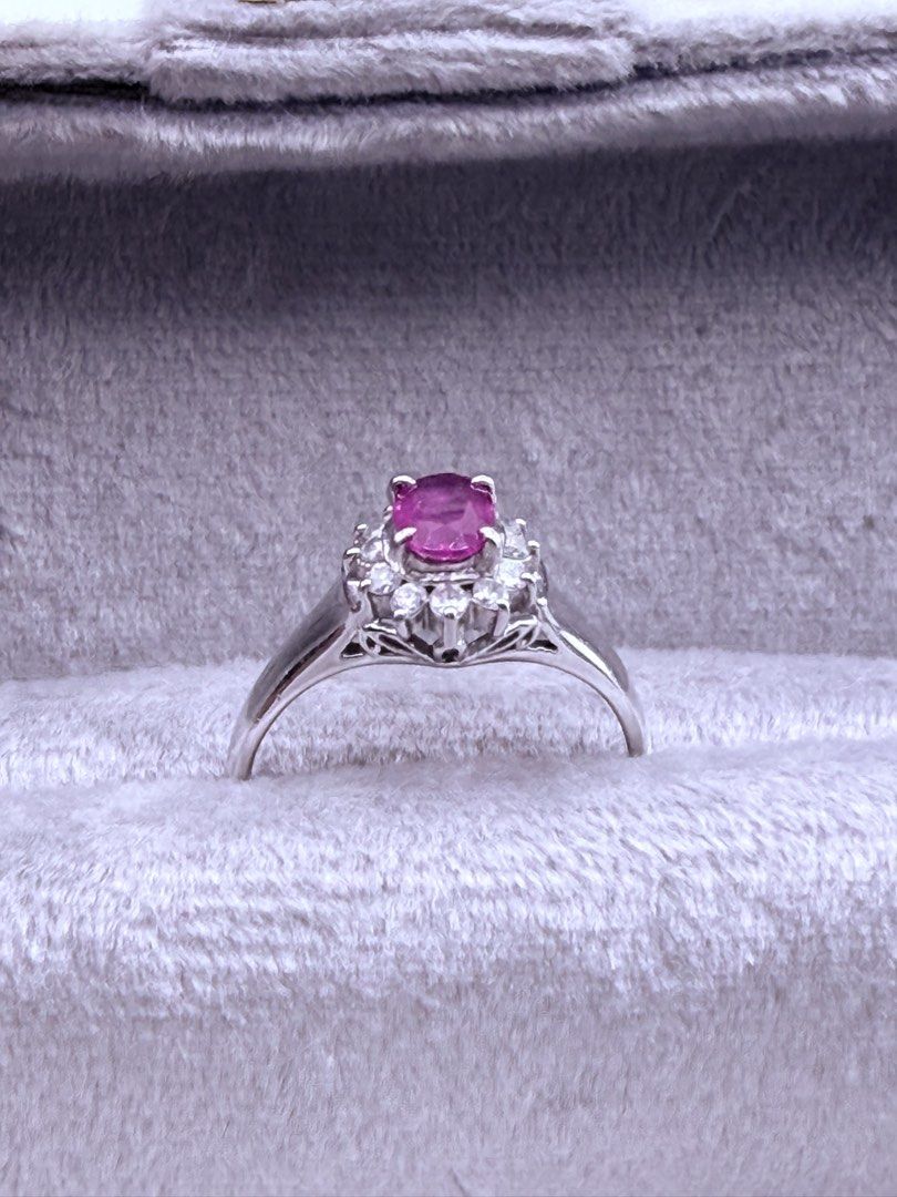 Ruby Diamond Ring (Category: Rings) located in Singapore. Submitted by Tenasious (Listing ID 1441053112, Image 2). Description: This Unique piece is a definite stunner, the masterfull combination of Ruby and unique placement of the Diamond to surround the Ruby Ruby Diamond Ring Natural Ruby 0.43 carat Natural Diamond 0.18 carat with PT900 hallmark 3.67 grams Us ring size 5.5/ HK 12 A showstopping Ring! Local certification & Repolishing can be arr
