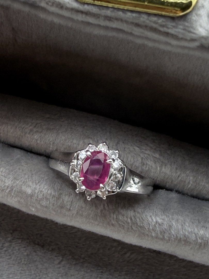 Ruby Diamond Ring (Category: Rings) located in Singapore. Submitted by Tenasious (Listing ID 1441053112, Image 3). Description: This Unique piece is a definite stunner, the masterfull combination of Ruby and unique placement of the Diamond to surround the Ruby Ruby Diamond Ring Natural Ruby 0.43 carat Natural Diamond 0.18 carat with PT900 hallmark 3.67 grams Us ring size 5.5/ HK 12 A showstopping Ring! Local certification & Repolishing can be arr