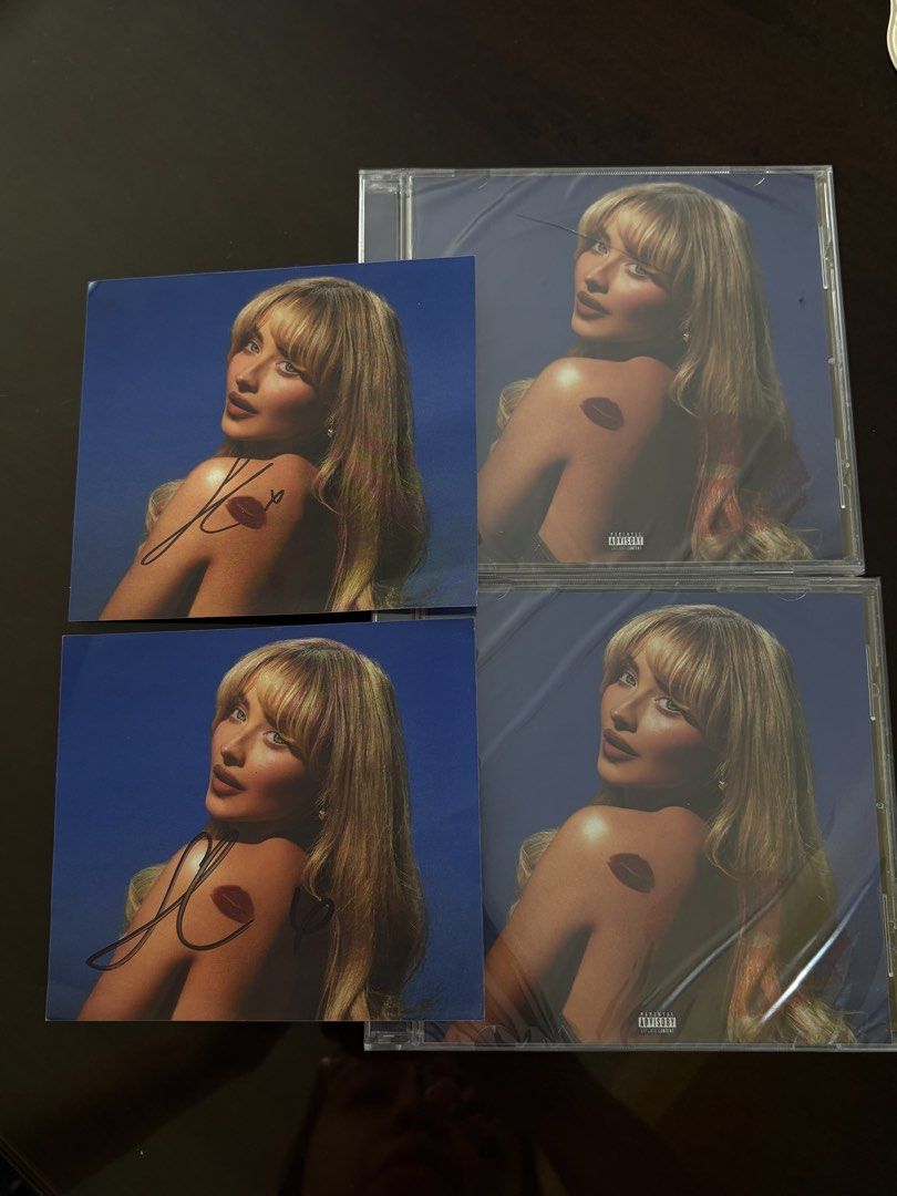 SALE Signed Sabrina Carpenter CD (Category: CDs & DVDs) located in Manila. Submitted by stefandraboutique (Listing ID 1440961960, Image 1). Description: - Two (2) signed CDs - Each features an autograph and a kiss mark graphic - Still in original plastic wrap - Ideal for collectors and fans - Unique memorabilia.