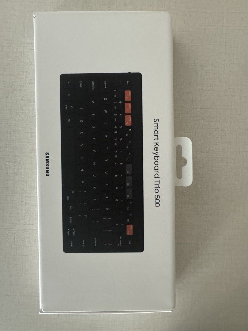 Samsung Smart Keyboard Trio 500 (Category: Computer Keyboard) located in Makati City. Submitted by gonz4669 (Listing ID 1440961019, Image 1). Description: - Samsung Smart Keyboard Trio 500 - Connects via Bluetooth - Slim and portable design - Multi-device connectivity - Ideal for on-the-go typing - Includes dedicated quick-access keys - Brand new, sealed box.