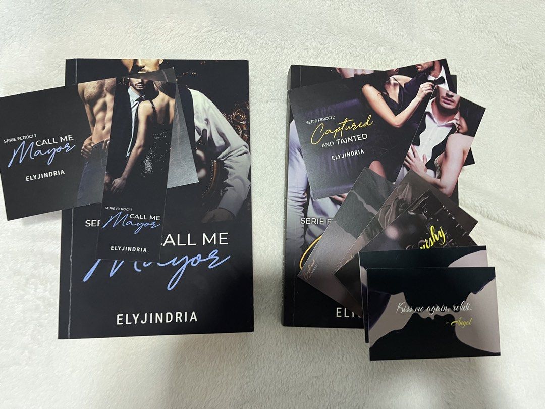 Serie Feroci Books 1 & 2 by ElyJindria (Category: Storybooks) located in Manila. Submitted by 4ngeluh (Listing ID 1441087638, Image 2). Description: - ₱1,000 for both - Both signed - With dedication - For Sale: Call Me Mayor (Book 1) - For Sale: Captured and Tainted (Book 2) - Part of the Serie Feroci by ElyJindria - Includes various photocards - Includes bookmarks - Great for fans of the series.