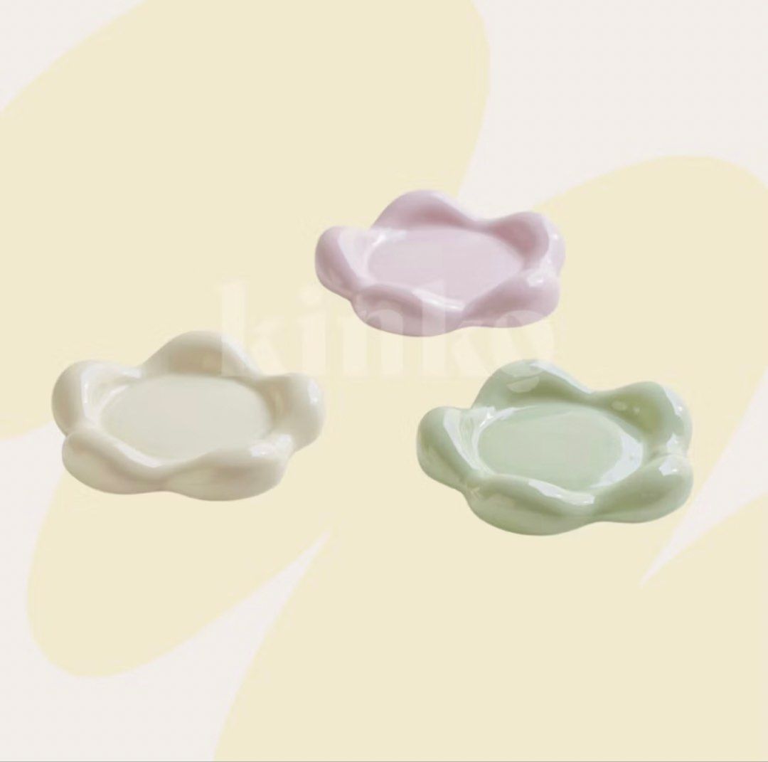 Shallow Pet Ceramic Bowl/Trinket Dish (Category: Dinnerware & Cutlery) located in Taguig. Submitted by mimosaaa_ (Listing ID 1441045596, Image 2). Description: Shallow ceramic cat food bowl. Got this from KinKo on orange app for my cats, tried once and they didn’t like it 🥲 Pristine condition! - Pastel Pink, Mint Green, White - Can be used as a trinket dish! - Selling for PHP 800 each, got them for PHP 840. Comes with their wooden stands and unu