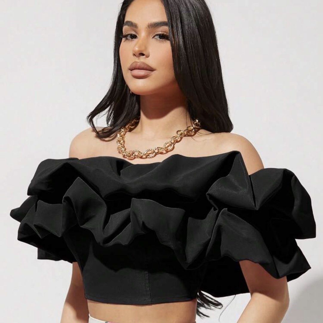 Shein Black Off-Shoulder Ruffle Crop Top (L) (Category: Others Tops) located in Tarlac. Submitted by milkshakeee_ (Listing ID 1440997499, Image 1). Description: - Used once only - Bought at ₱788 - Black off-shoulder crop top - Features dramatic ruffles on neckline and sleeves - Fitted bodice for a structured look - Ideal for parties or a night out.