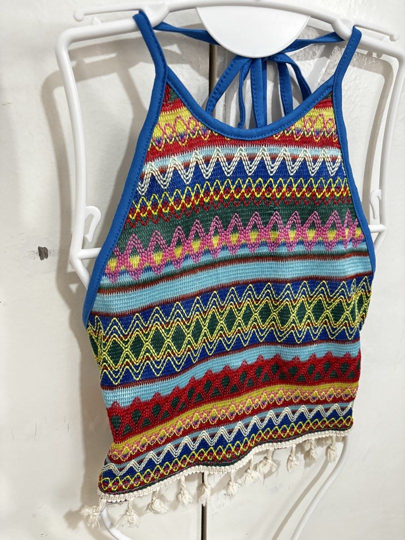 Shein Crochet Boho Halter Neck Crop Tassel Top (Category: Others Tops) located in Manila. Submitted by dianafayesimbre (Listing ID 1441061098, Image 2). Description: - Colorful boho-inspired crop top - Features a vibrant Aztec-style geometric pattern - Halter neck with adjustable tie-back closure - Fringed tassel detail along the hem - Ideal for festivals, beach days, or adding a unique touch to your outfit - Size XL on tag but can also fit L.