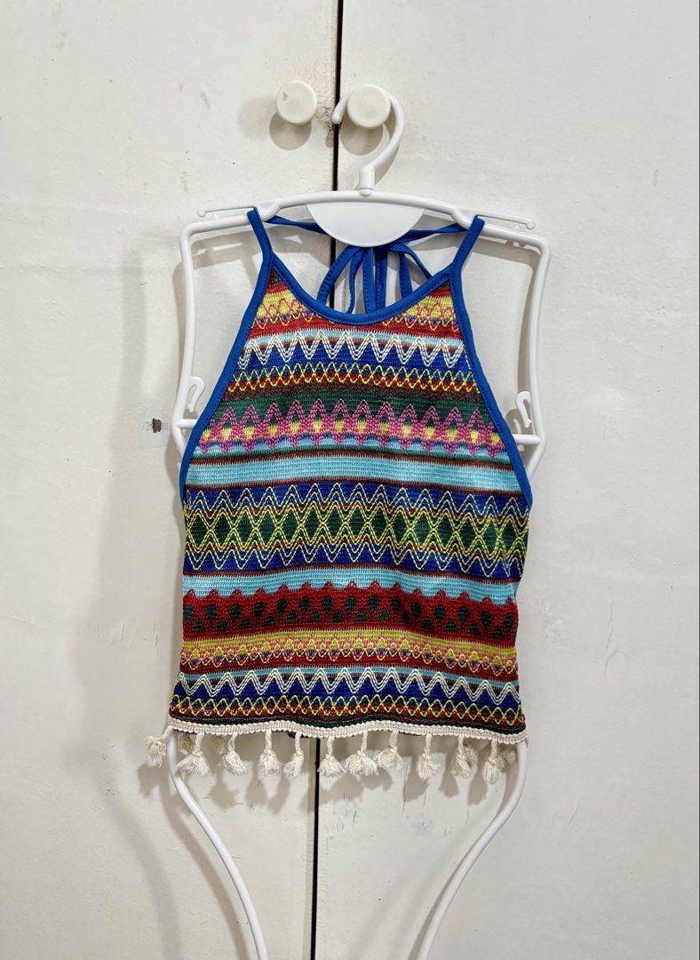 Shein Crochet Boho Halter Neck Crop Tassel Top (Category: Others Tops) located in Manila. Submitted by dianafayesimbre (Listing ID 1441061098, Image 1). Description: - Colorful boho-inspired crop top - Features a vibrant Aztec-style geometric pattern - Halter neck with adjustable tie-back closure - Fringed tassel detail along the hem - Ideal for festivals, beach days, or adding a unique touch to your outfit - Size XL on tag but can also fit L.