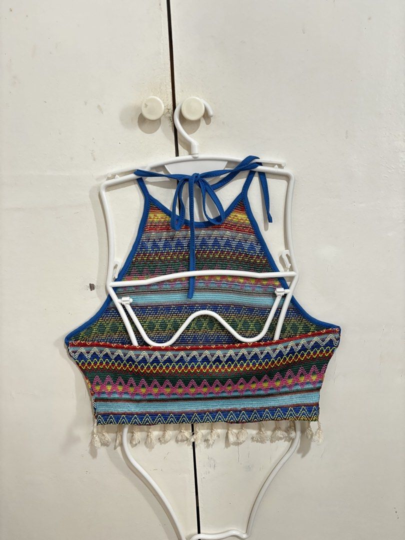Shein Crochet Boho Halter Neck Crop Tassel Top (Category: Others Tops) located in Manila. Submitted by dianafayesimbre (Listing ID 1441061098, Image 3). Description: - Colorful boho-inspired crop top - Features a vibrant Aztec-style geometric pattern - Halter neck with adjustable tie-back closure - Fringed tassel detail along the hem - Ideal for festivals, beach days, or adding a unique touch to your outfit - Size XL on tag but can also fit L.