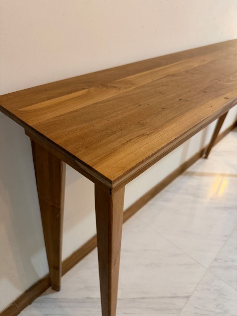 Solid Wood Table (Category: Tables & Sets) located in Singapore. Submitted by jgoodsandservices (Listing ID 1440957408, Image 3). Description: Can be used as entryway, console, or a general table. Slim and long. - Slim solid wood console table - Ideal for entryways or narrow spaces - Features natural wood grain - Simple, clean design moving out so selling it. Check my listings for more :).