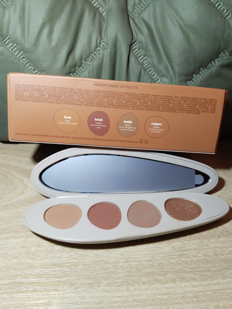 Sunnies Face Healthy Touch Eyeshadow Palette (Category: Makeup) located in Valenzuela. Submitted by miracle0326 (Listing ID 1436980291, Image 1). Description: - Sunnies Face Healthy Touch Eyeshadow Palette - Warm Terracotta shades - Includes: Toast, Brick, Buddy, and Snapper - Features a mirror (unused mirror) - Sleek, oval compact - Ideal for creating warm, everyday eye makeup looks - Versatile shades for various styles RFS: too many makeups use