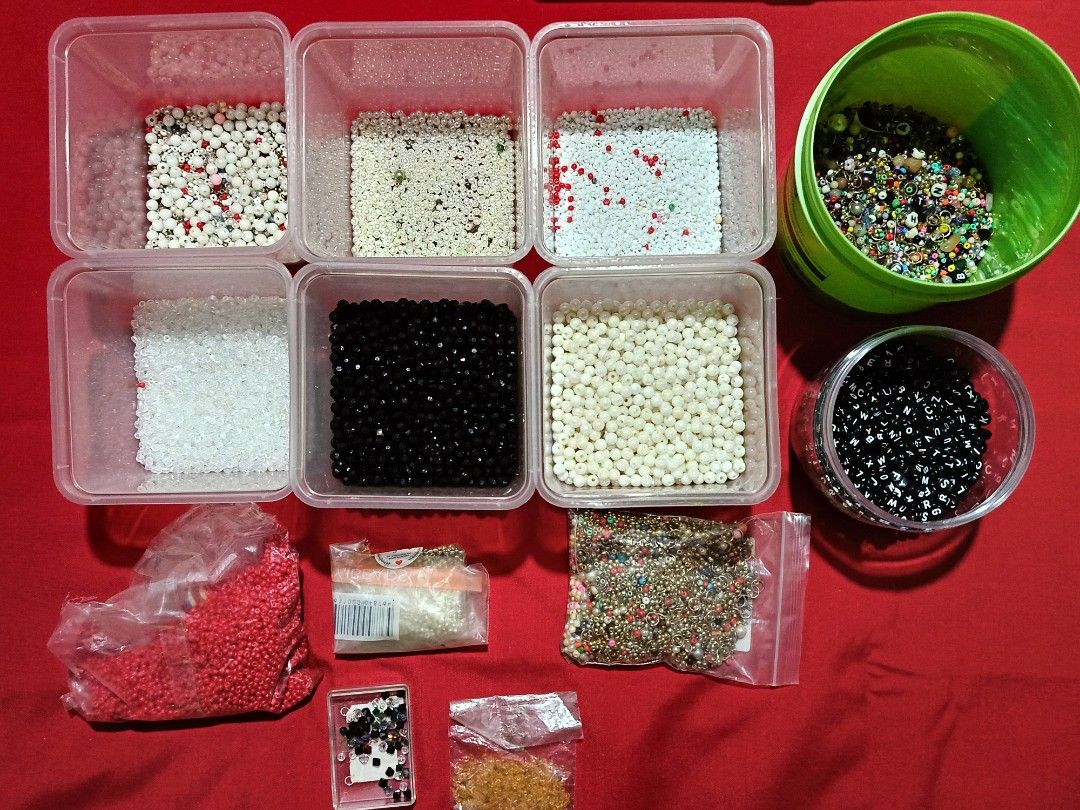 TAKE ALL BEADS (Category: Craft Supplies & Tools) located in Manila. Submitted by okflipzskie (Listing ID 1441141536, Image 1). Description: - Large collection of beads in various colors: clear, white, black, red, and mixed. - Assorted charms, jump rings, clasps, and jewelry wire included. - Comes with a bead organizer box to keep everything tidy. - Includes other essential crafting tools. - Ideal for all your DIY jewelry making projects..