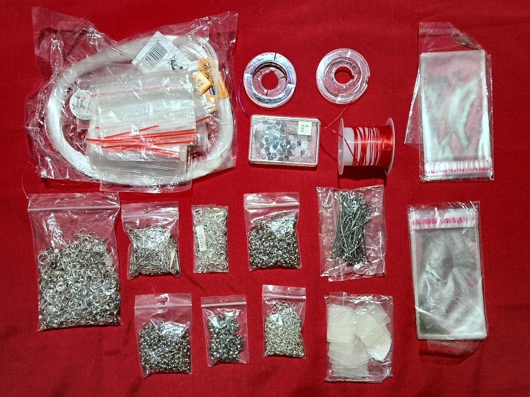 TAKE ALL BEADS (Category: Craft Supplies & Tools) located in Manila. Submitted by okflipzskie (Listing ID 1441141536, Image 3). Description: - Large collection of beads in various colors: clear, white, black, red, and mixed. - Assorted charms, jump rings, clasps, and jewelry wire included. - Comes with a bead organizer box to keep everything tidy. - Includes other essential crafting tools. - Ideal for all your DIY jewelry making projects..