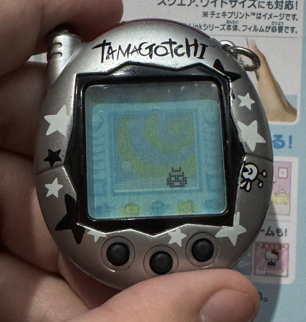 Tamagotchi Connection Connexion v3 Version 3 Europe Silver Star (Category: Interactive Toys) located in Binangonan. Submitted by hanschristiancristobal (Listing ID 1441136872, Image 3). Description: Tamagotchi Connection Connexion Version 3 v3 Europe Release Silver Star shell Bought secondhand, see pics for condition Original packaging still intact, opened from bottom part Tested Meetups in Binangonan, Rizal Maya/Gcash/Instapay/QR PH/Unionbank/BP
