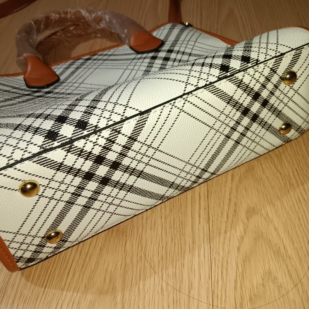 Trendy Plaid Crossbody Bag (Category: Tote Bags) located in Taguig. Submitted by ncomn (Listing ID 1441092247, Image 3). Description: - Plaid tote bag, includes a matching small pouch and detachable straps - Like new and never used .
