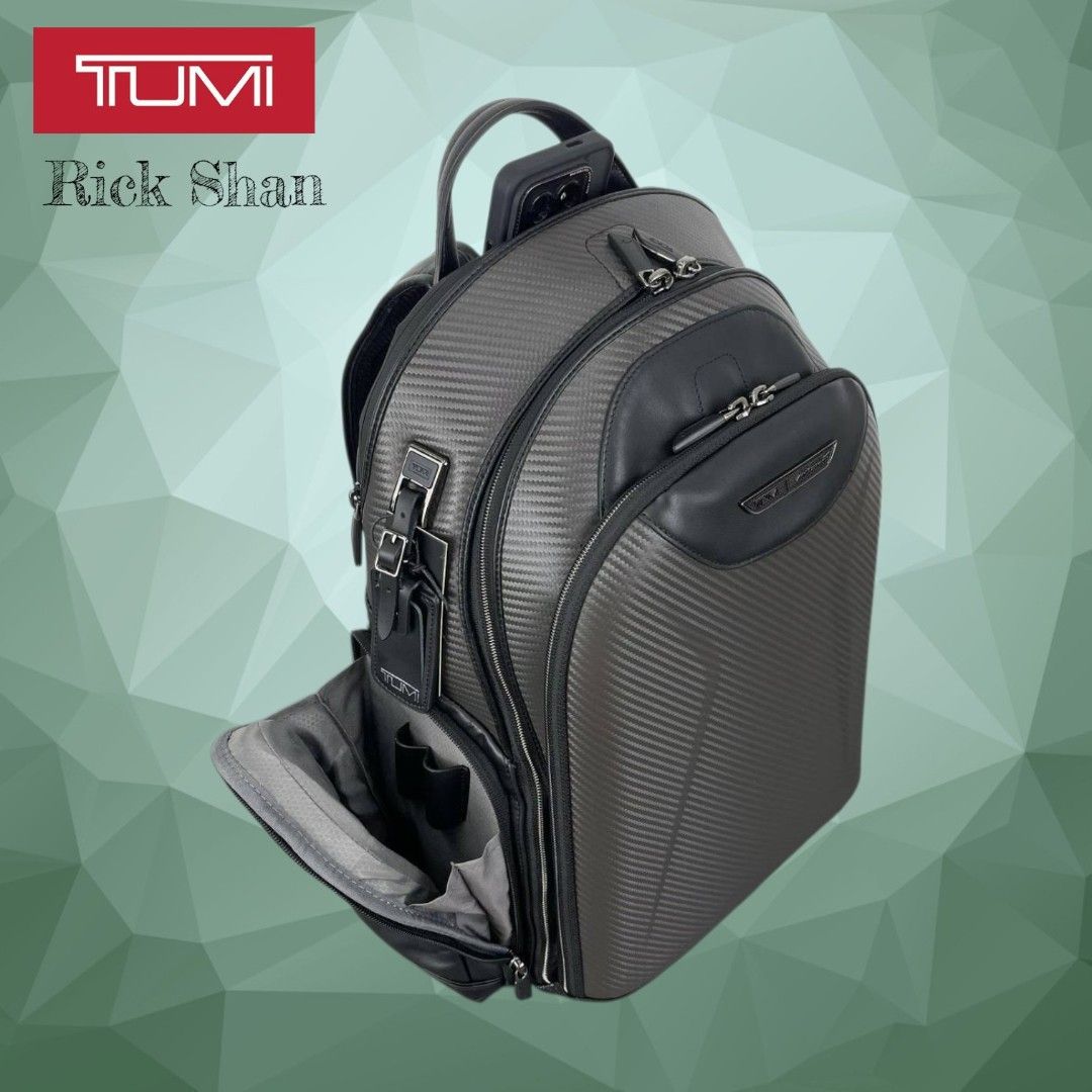 Tumi Backpack Black Carbon Fiber Leather (Category: Backpacks) located in Manila. Submitted by r1ckshan (Listing ID 1441013422, Image 2). Description: Tumi backpack in black. Features carbon fiber texture and leather accents. Multiple compartments, padded straps, and top handle. Perfect for daily use or travel..