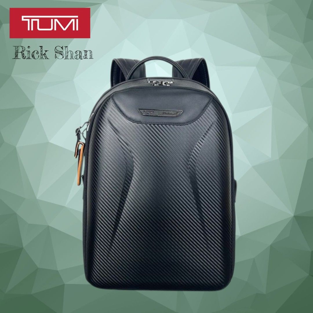 Tumi Backpack Black Carbon Fiber Leather (Category: Backpacks) located in Manila. Submitted by r1ckshan (Listing ID 1441013422, Image 1). Description: Tumi backpack in black. Features carbon fiber texture and leather accents. Multiple compartments, padded straps, and top handle. Perfect for daily use or travel..