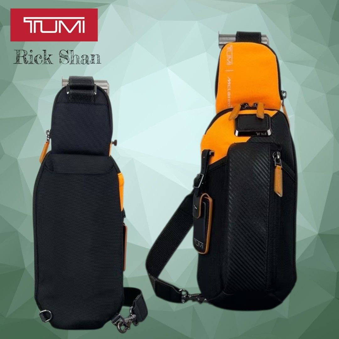 Tumi McLaren Sling Bag Orange Black (Category: Sling Bags) located in Manila. Submitted by r1ckshan (Listing ID 1441007329, Image 1). Description: Tumi McLaren sling bag in black with orange accents. Features a wide-opening main compartment, internal pockets, and an adjustable strap. Perfect for travel or daily use..