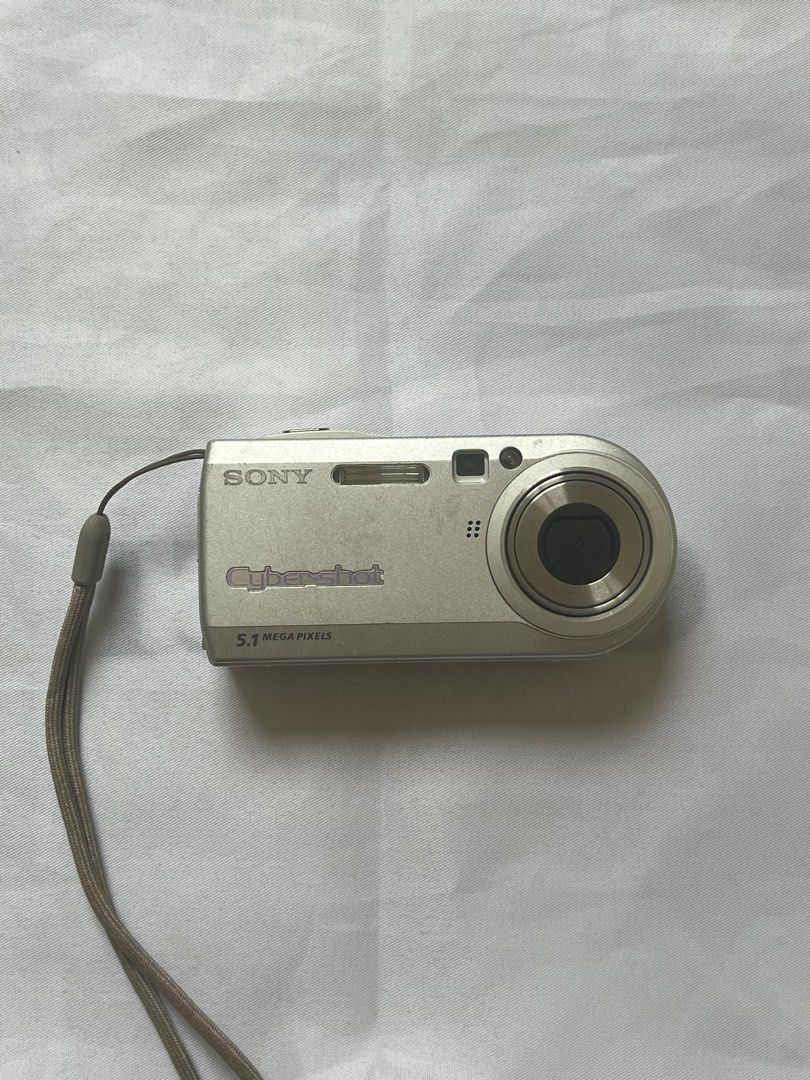 [UNTESTED] Sony Cyber-shot 5.1 Megapixels Digital Camera (Category: Cameras) located in Mandaluyong City. Submitted by lysfiles (Listing ID 1440994683, Image 1). Description: 🔎 untested; sold AS-IS 🔎 cosmetic: good vintage condition with some minor surface wear from age 🔎 what’s included: sony cybershot 5.1MP camera, attached wrist strap (no battery, charger, or memory card included) 🔎 no returns or refunds.