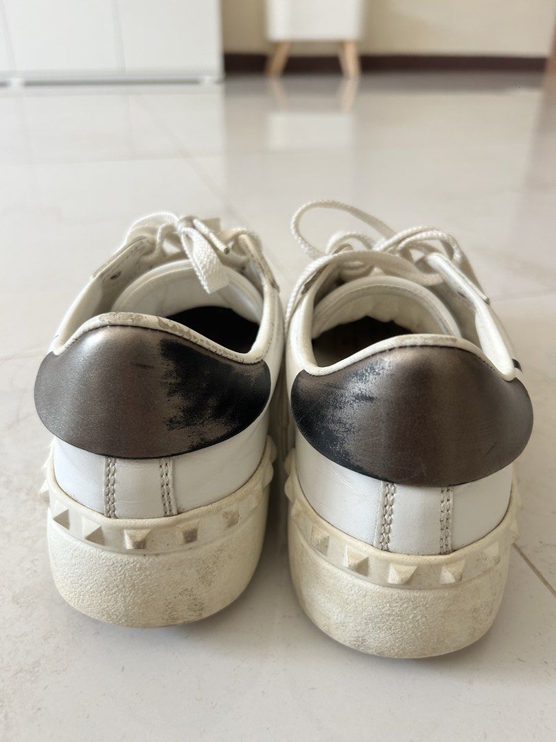 Valentino White Leather Rockstud Sneakers (Category: Sneakers) located in Cebu City. Submitted by carms123 (Listing ID 1440958943, Image 2). Description: - Authentic Valentino white leather sneakers - Black accent details - Iconic stud detailing along the sole - White laces - Size 36 - Shows minor signs of wear on heels and soles - Ideal for casual and everyday wear Bought maybe 6 years ago in Italy- have touched it in years .