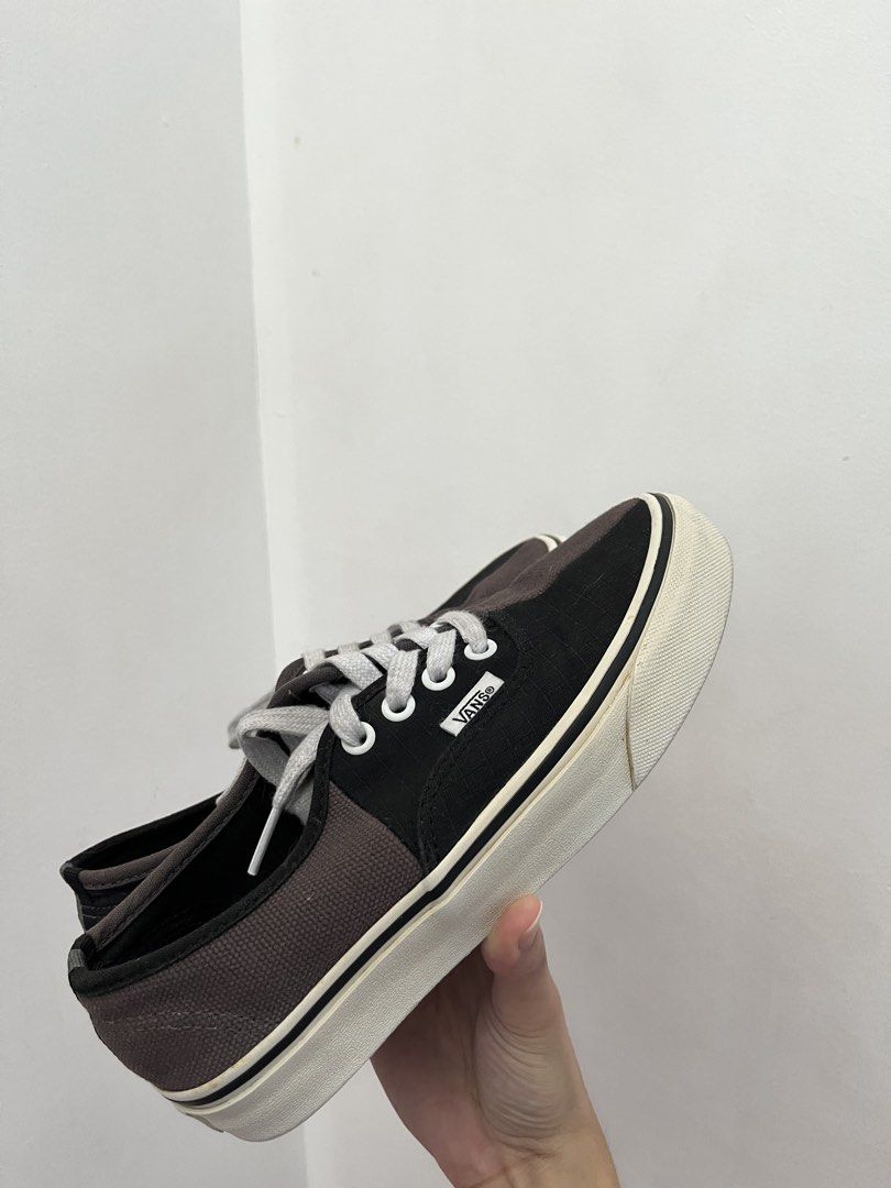 Vans Authentic Sneakers Black Brown (Category: Sneakers) located in Quezon City. Submitted by declutter_xo (Listing ID 1441147934, Image 1). Description: - Classic Vans Authentic sneakers - Stylish two-tone black and brown colorway - Crisp white laces and signature white rubber sole - Iconic Vans logo tab on the side - Durable waffle sole for excellent grip - Ideal for everyday casual wear.