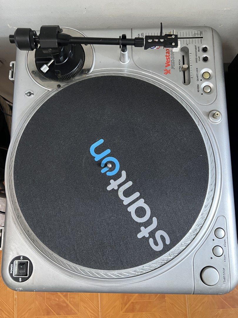 Vestax PDX-2000 Turntable & PMC-07 Pro Mixer Bundle (Category: Other Audio Equipment) located in Taguig. Submitted by petekurtlie_ (Listing ID 1440956782, Image 2). Description: - Vestax PDX-2000 Turntable - Vestax PMC-07 Pro Mixer - Classic DJ Gear - Turntable includes Stanton slipmat - Mixer features multiple inputs/outputs - Tested and confirmed working - Turntable has minor cosmetic wear on the edge - Ideal for any DJ setup.