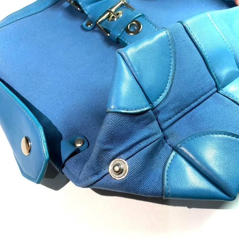 Vintage Blue Tote / Hand Bag (Category: Tote Bags) located in Las Pinas. Submitted by rewearstudios (Listing ID 1441137749, Image 3). Description: The bag’s exterior features vintage classic design with belt-like accent leather straps. Zip closure main compartment. One zip closure interior compartment. Very spacious and can fit your everyday essentials and more! Excellent condition. Pm me for more pics and details!.
