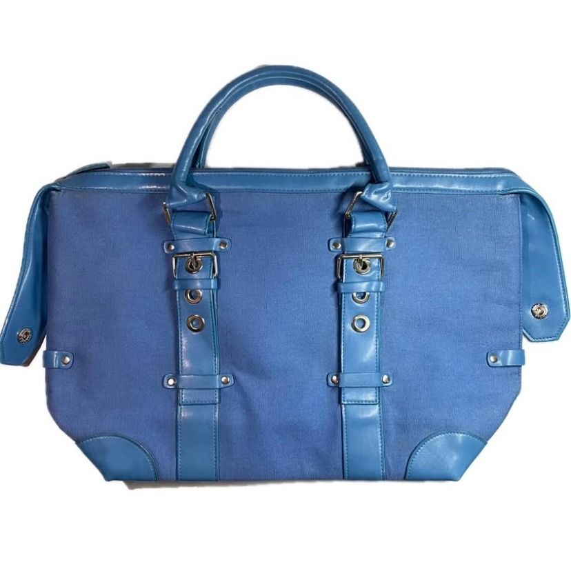 Vintage Blue Tote / Hand Bag (Category: Tote Bags) located in Las Pinas. Submitted by rewearstudios (Listing ID 1441137749, Image 1). Description: The bag’s exterior features vintage classic design with belt-like accent leather straps. Zip closure main compartment. One zip closure interior compartment. Very spacious and can fit your everyday essentials and more! Excellent condition. Pm me for more pics and details!.
