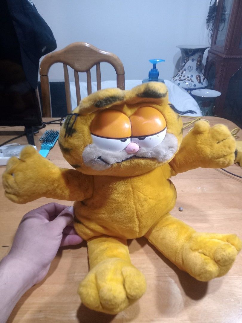 Vintage Garfield Plush Toy (Category: Plushies & Soft Toys) located in Makati City. Submitted by pardsroman (Listing ID 1441064720, Image 1). Description: - Classic Garfield plush toy - Orange and yellow with black stripes - Floppy arms and legs - Great for any Garfield fan - Shows some signs of wear due to age - Still has its original tag MOP via BPI or gcash payment first before delivery no return no exchange. shipping at buyers expense.