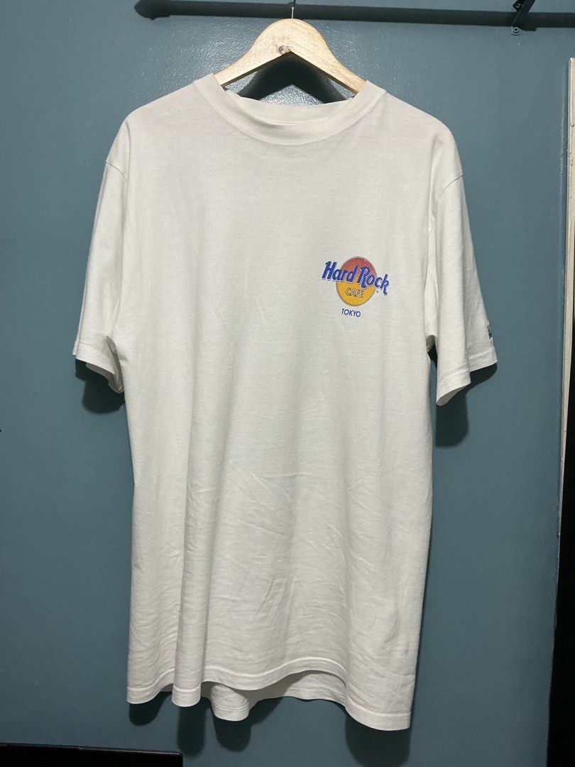 Vintage 90's Hard-Rock Cafe Tokyo Tee (Category: Tshirts & Polo Shirts ) located in Bulacan. Submitted by garmentsbyadi. (Listing ID 1441062477, Image 2). Description: Vintage Hard-Rock Cafe Tokyo Tee with HRC tag Authentic Hard rock Cafe Tokyo Tee Size: Large on tag Length: 22 Width: 30 Condition: Excellent Color rate: 9/10 Issue: See last picture for reference .