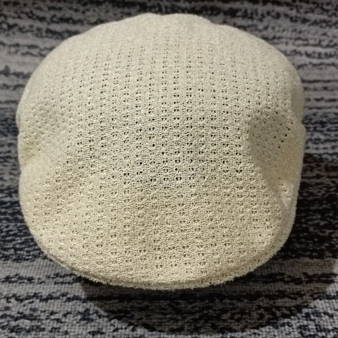 Vintage Kangol Mesh Ivy Cap (Category: Caps & Hats) located in Quezon City. Submitted by lem1998 (Listing ID 1441087870, Image 1). Description: Elevate your accessory collection with this classic, pre-loved Kangol ivy cap. Crafted with a lightweight, breathable mesh texture in a versatile cream/off-white tone, this piece offers timeless style perfect for warmer weather. ​Details ​Brand: Kangol ​Style: Ivy Cap / Flat Cap ​Size: Medium (M) ​Origin: