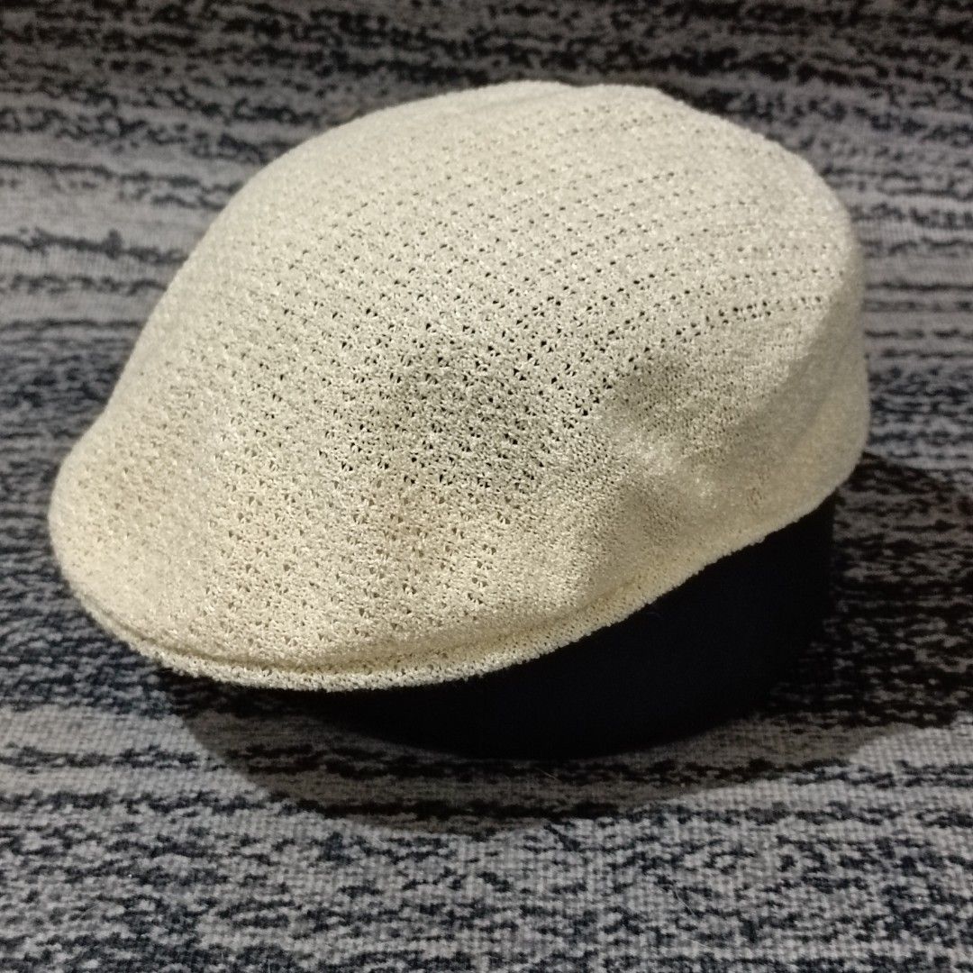 Vintage Kangol Mesh Ivy Cap (Category: Caps & Hats) located in Quezon City. Submitted by lem1998 (Listing ID 1441087870, Image 2). Description: Elevate your accessory collection with this classic, pre-loved Kangol ivy cap. Crafted with a lightweight, breathable mesh texture in a versatile cream/off-white tone, this piece offers timeless style perfect for warmer weather. ​Details ​Brand: Kangol ​Style: Ivy Cap / Flat Cap ​Size: Medium (M) ​Origin: