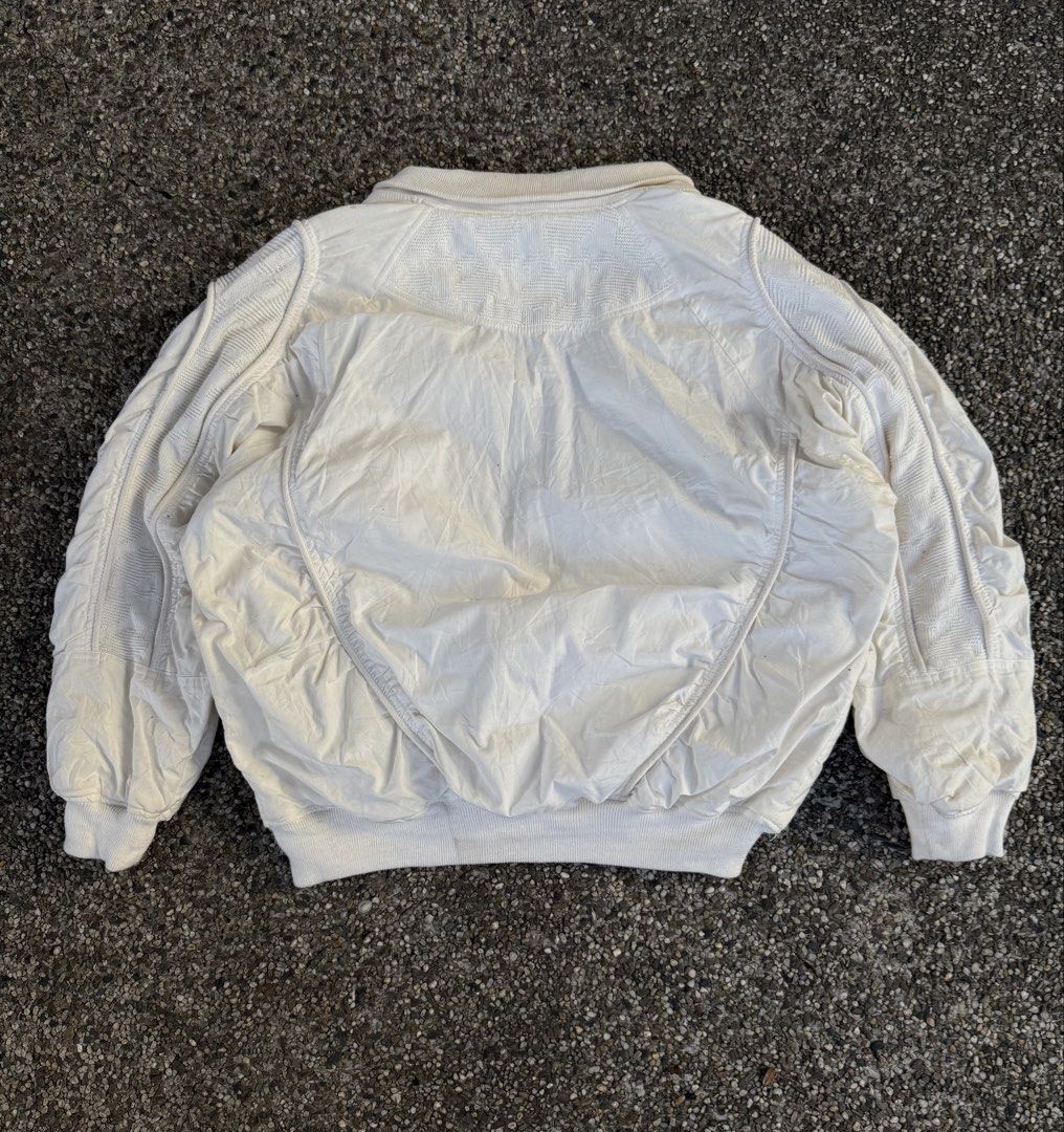 Vintage New West Woven & Piped Bomber (Category: Coats, Jackets and Outerwear) located in Quezon City. Submitted by though.bare (Listing ID 1441125788, Image 2). Description: Fits on L-XL for Men In good, worn condition. Width : 26.5" Length : 27" Sleeve : 30" (Neck to cuff) Shoulder : N/A No-when worns. Listings not marked sold/reserved are available. These are preloved/used items, manage expectations. Visit my profile for more! .