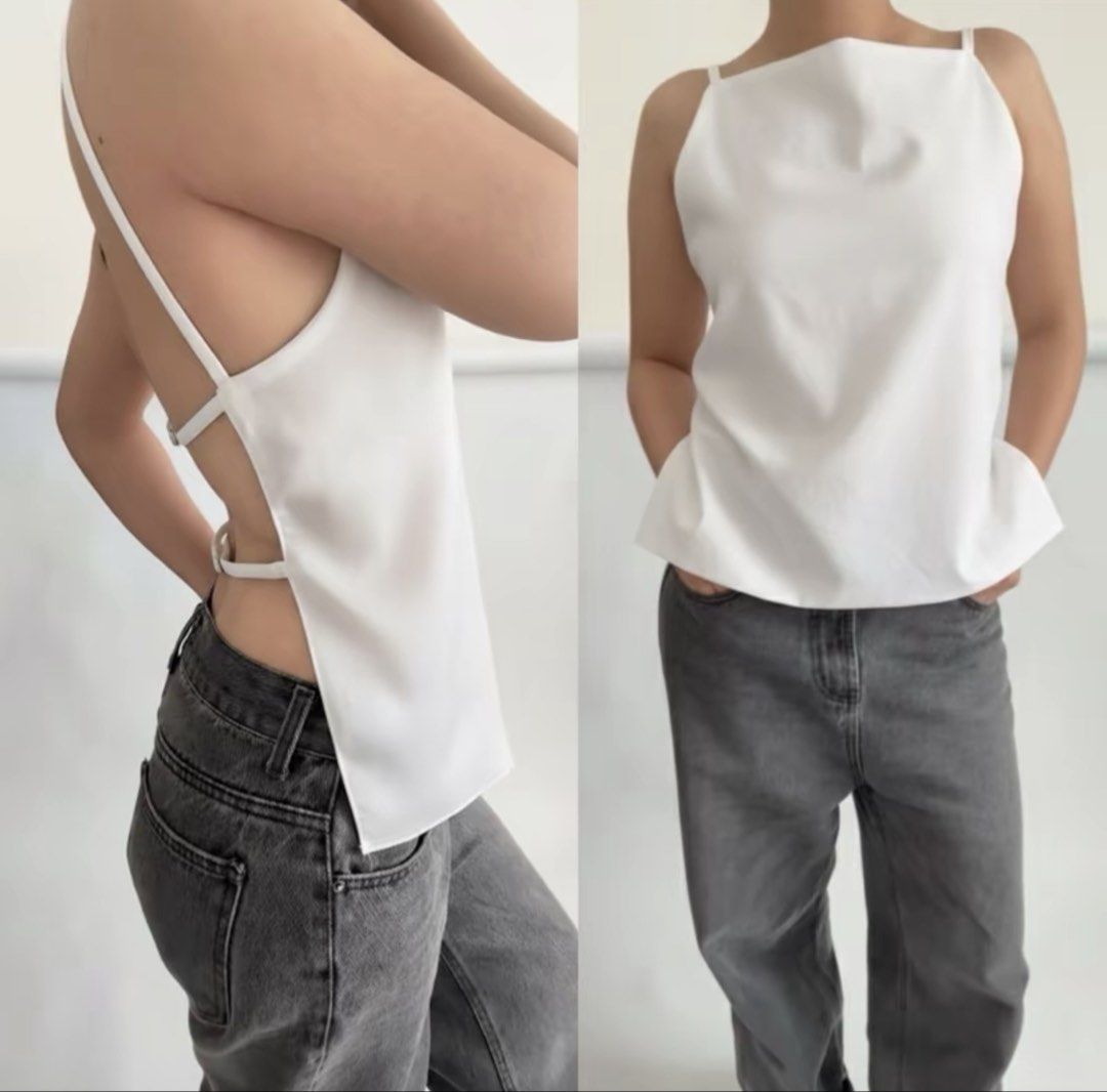 White Backless Top (Category: Sleeveless) located in Manila. Submitted by clairdeclutters (Listing ID 1441091969, Image 2). Description: - Unique backless design - Very nice, pretty, and sexy in person - Comfy fabric - Worn once and can fit up to large - Message me for more pics :) .