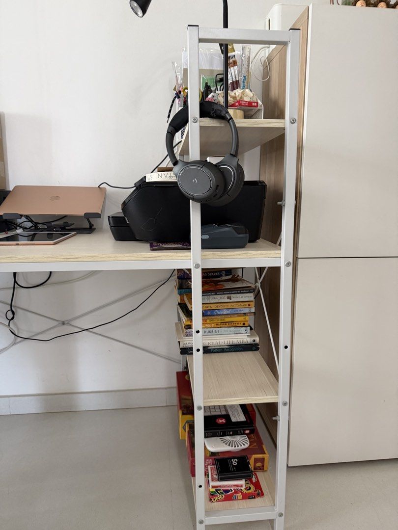 Study Table| Office table (Category: Tables & Sets) located in Singapore. Submitted by winter_mountains (Listing ID 1440975454, Image 3). Description: H-70cm L-120 W-60 Height of side shelves- 115cm - Complete desk setup for your home office or study. - Light wood desk with white metal legs. - Matching shelving unit. - Includes: Printer, laptop, tablet, books, headphones, office supplies. - All items neatly organized and ready to go..