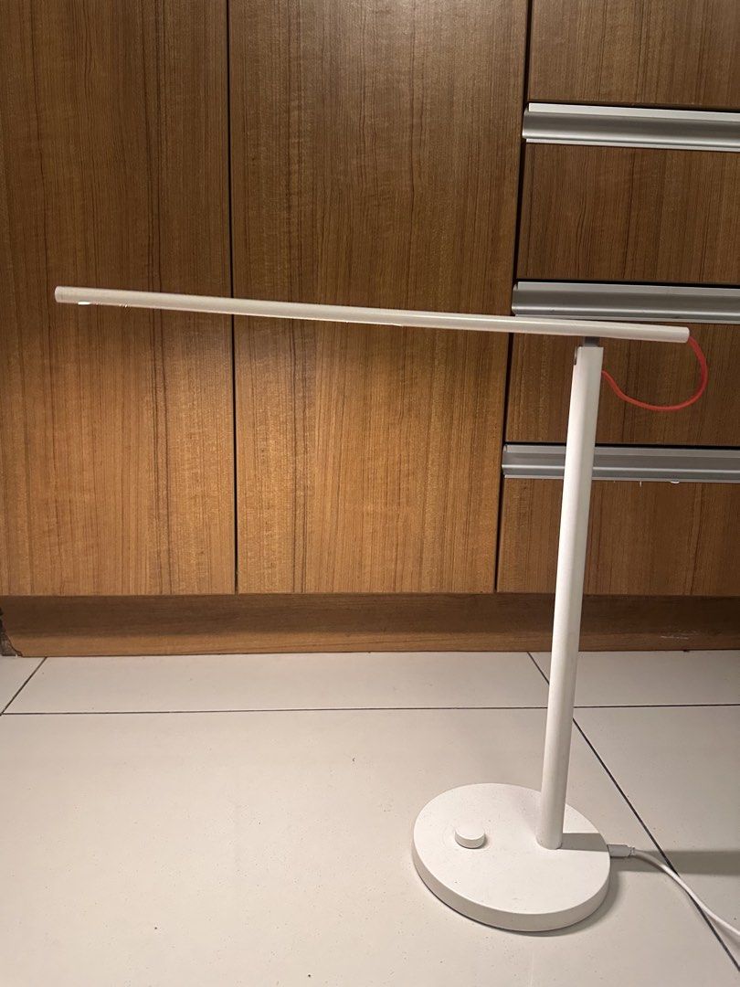 Xiaomi LED Desk Lamp 1S (Category: Lighting) located in Makati City. Submitted by dreeeindacity (Listing ID 1441078575, Image 2). Description: - Smart LED Desk Lamp - Adjustable arm - Adjustable brightness & temperature Works fine but only issue is that the light arm no longer stays up (common issue with this lamp). I hang a weight on the red wire for it to stay in a specific angle..
