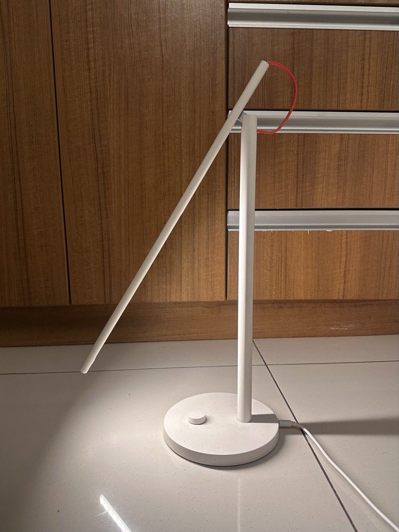 Xiaomi LED Desk Lamp 1S (Category: Lighting) located in Makati City. Submitted by dreeeindacity (Listing ID 1441078575, Image 1). Description: - Smart LED Desk Lamp - Adjustable arm - Adjustable brightness & temperature Works fine but only issue is that the light arm no longer stays up (common issue with this lamp). I hang a weight on the red wire for it to stay in a specific angle..