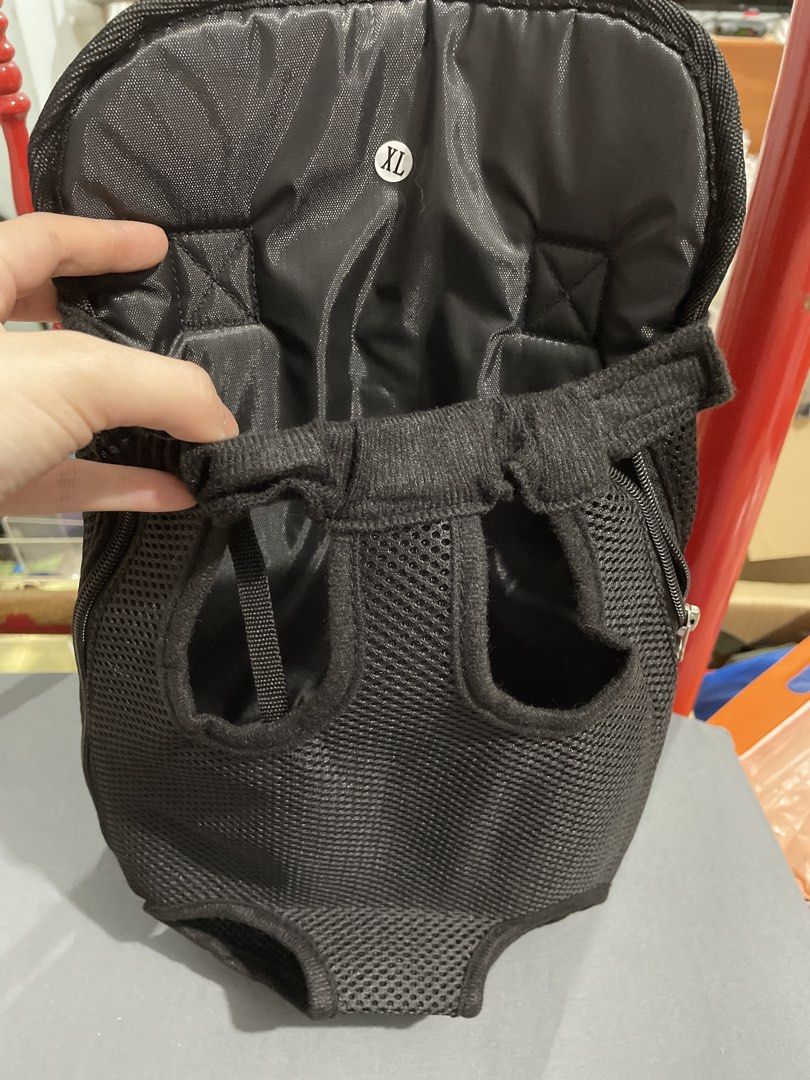 XL Pet Backpack Carrier - Black & Grey Mesh (Category: Homes & Other Pet Accessories) located in Singapore. Submitted by babyelephant_88 (Listing ID 1440907938, Image 3). Description: - Selling 2 XL Pet Backpacks - Colors: 1 Black, 1 Grey Mesh - Grey mesh design for enhanced ventilation - Size: XL (Extra Large) - Condition: Brand new, still in original packaging - Perfect for transporting your pet comfortably.