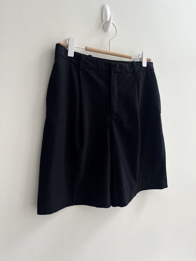 Zara Basic Black Pleated Bermuda Shorts Size S (Category: Shorts) located in Paranaque City. Submitted by papermuse (Listing ID 1441033947, Image 2). Description: - Zara Basic black shorts - Features a pleated front - Classic button and zip closure - Made in Spain - Versatile for casual and smart-casual outfits - Easy to pair with various tops MOP: BPI / GCash Shipping: Gogoxpress, Grab, Lalamove MOP: BPI / GCash Shipping: Gogoxpress, Grab, Lalam