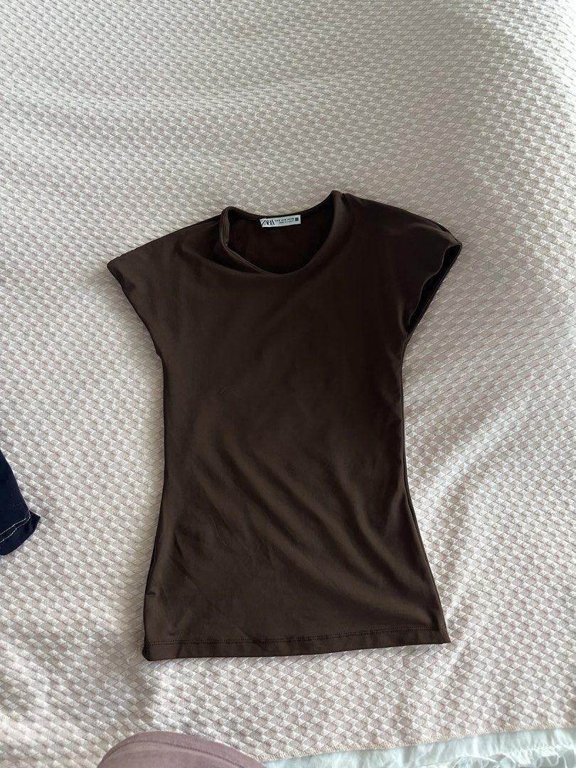 Zara Brown Cap Sleeve Top (Category: Shirts) located in Quezon City. Submitted by smileybeans (Listing ID 1441037227, Image 1). Description: Brand new no tags Available for same day delivery Shipping 55 within mm and 165 provincial.