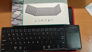 Foldable Bluetooth Keyboard with Touchpad452927015858350080