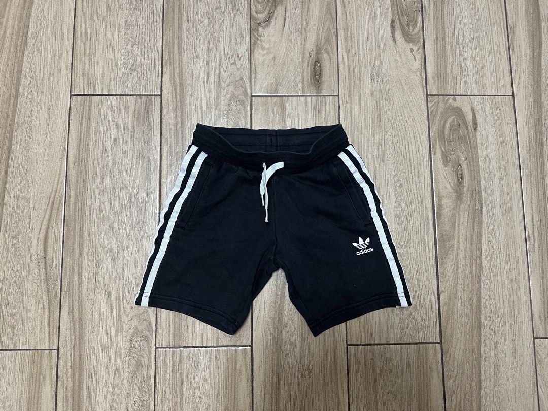 Adidas Black Shorts with White Stripes (Category: Shorts) located in Manila. Submitted by sircee6 (Listing ID 1436042175, Image 1). Description: - 3-5 y/o - Black Adidas shorts - White stripes on sides - Adidas logo on left leg - Drawstring waistband - Soft material - Ideal for casual or sports use.