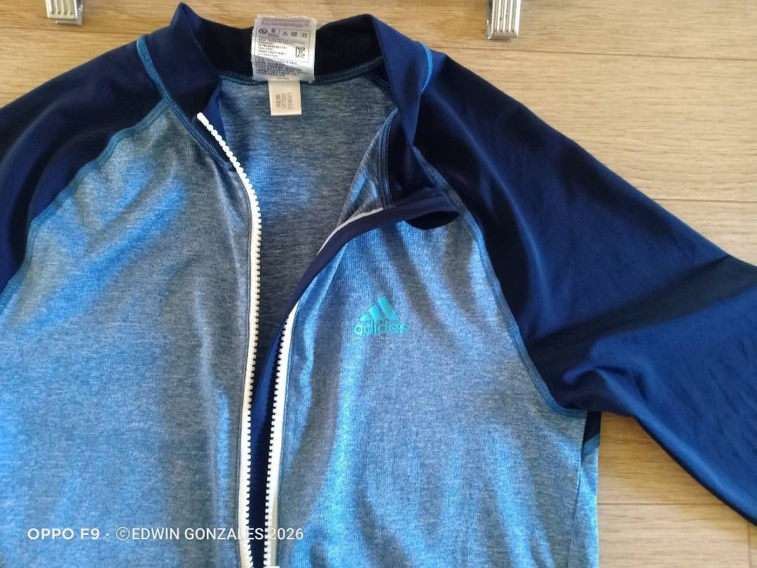 ADIDAS RASH GUARDS SIZE 160 (Category: Swim Top & Rash Guards) located in Nasipit. Submitted by edwingonzales498-69377 (Listing ID 1436001650, Image 3). Description: Original Adidas Zipper Rash Guard Size 160 on tag (Fits Xs to Small)Unisex Excellent to like new condition Good for beach outing , iwas sa init. 🔖Php 349 only (Noted: Mai heart na sticker to avoid restrictions).