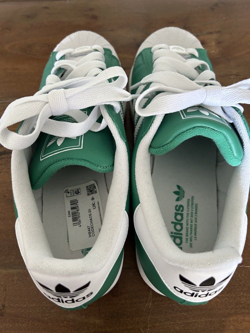 Adidas Superstar Green White Sneakers US9.5/UK9 (Category: Sneakers) located in Taguig. Submitted by mdinvestbuildtrade (Listing ID 1435951791, Image 3). Description: Adidas Lifestyle Superstar II Shoes Unisex Green JI3076 (Boston Celtics inspired) Bought in Bangkok and realized it’s half size smaller - Adidas Superstar sneakers - Green and white colorway - Boston Celtics inspired - Classic three stripes design - Size: UK 9 / US 9.5 - Unworn cond