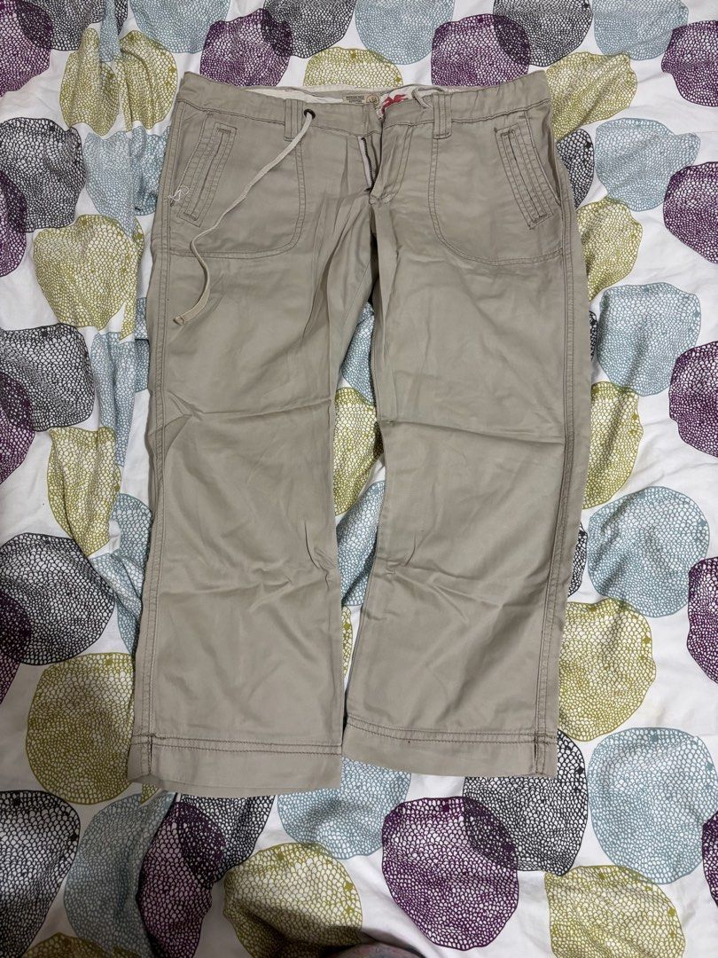 American Eagle Outfitters Khaki low waisted Pants (Category: Jeans) located in Manila. Submitted by loopy99999 (Listing ID 1436053236, Image 1). Description: (HOOK FELL OFF) but can still be worn from the drawstring - American Eagle Outfitters khaki pants - Size: 6 - Features a single back pocket with red embroidered logo - Material: 100% cotton - Made in Hong Kong - Style: Classic casual.